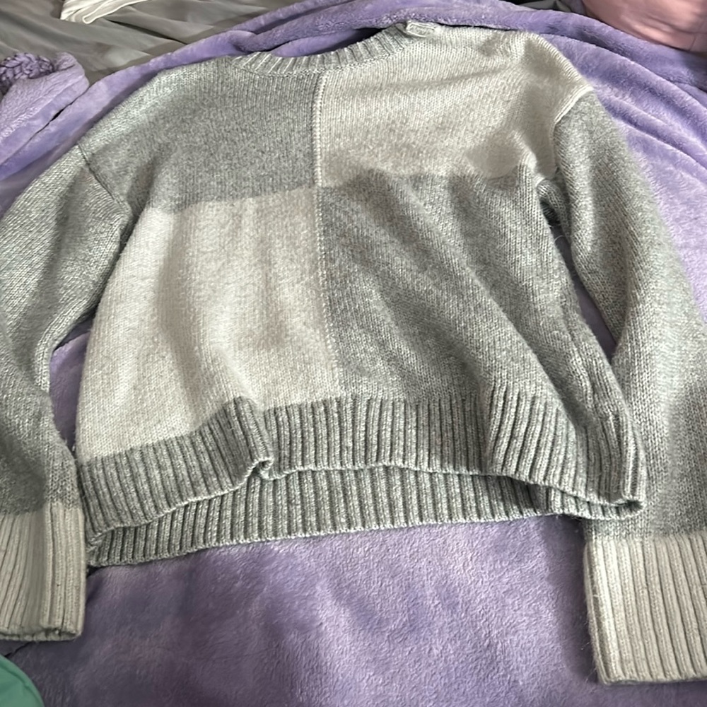 grey and white sweater